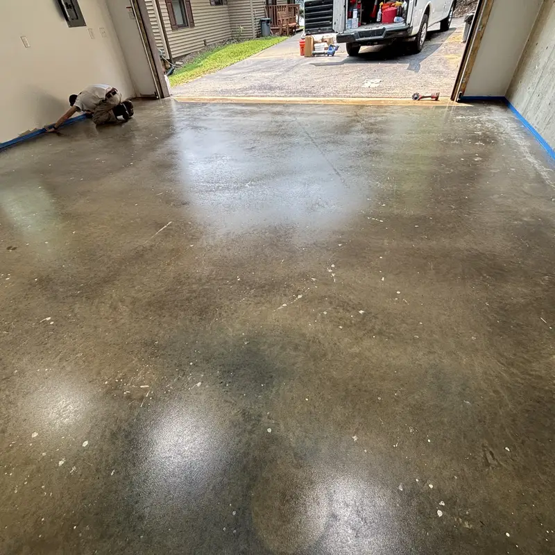 Sealed Garage Floor Crew Working Roanoke Va